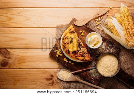 Typical Venezuelan Cuisine, Top View Of A Wooden Table With Several Ingredients For The Preparation 