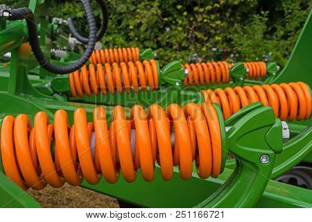 Shock Absorbers Of The Agricultural Unit, Which Create Impacts On The Soil By Working Parts, In Orde