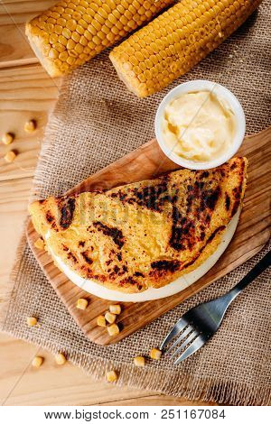 Cachapa With Cheese, Typical Venezuelan Dish Made With Corn, Cheese And Butter