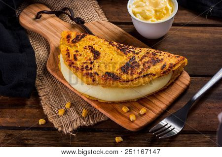Cachapa With Cheese, Typical Venezuelan Dish Made With Corn, Cheese And Butter