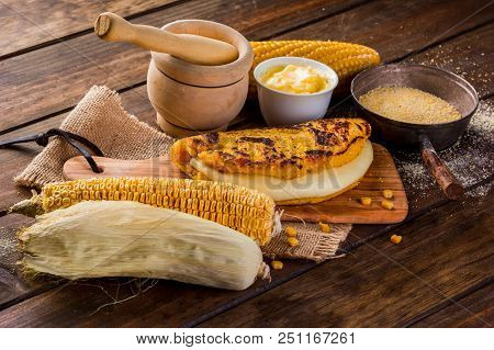Typical Venezuelan Cuisine, Top View Of A Wooden Table With Several Ingredients For The Preparation 