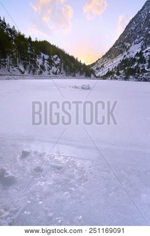 Panticosa snow frozen lake ice in Huesca Pyrenees of Spain