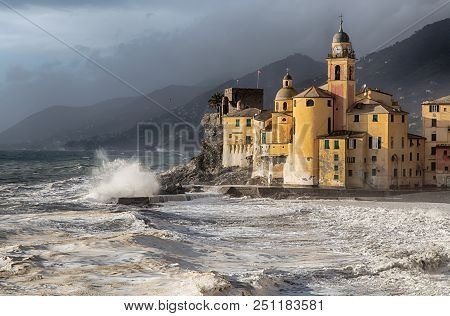 Old Church With Rough Sea And Big Waves In Camogli, Genoa, (genova), Italy