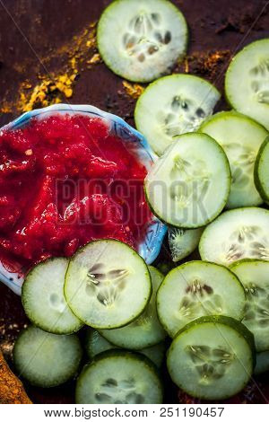 Close Up Of Ingredients An Face Pack Of Raw Fresh Vegetables  On Gothic Surface I.e. Tomato Puree An