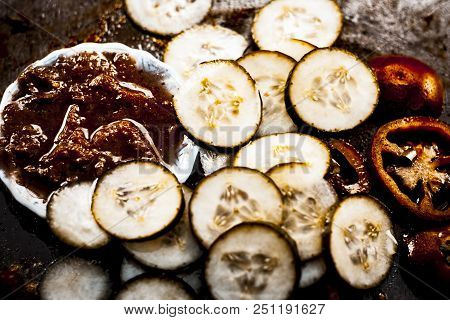 Close Up Of Ingredients An Face Pack Of Raw Fresh Vegetables  On Gothic Surface I.e. Tomato Puree An