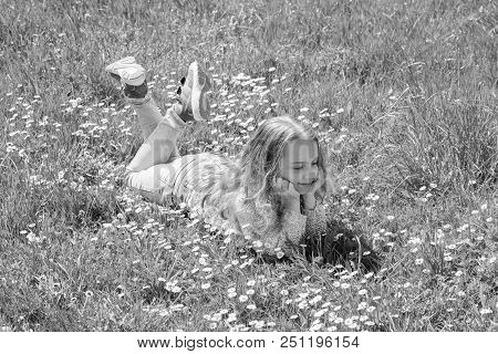 Peace And Tranquil Concept. Girl On Calm Face Spend Leisure Outdoors. Child Enjoy Spring Sunny Weath