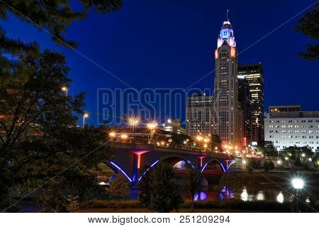 Columbus, Ohio  riverfront along the Scioto River.  The Scioto Mile pathways create a popular park area in the downtown district of the city.  New lights were installed on the Broad St. Bridge.