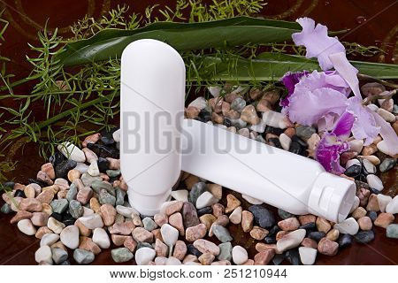 Container For Advertising Creams- White Cosmetic Tube Decorated With Orchids And Stones