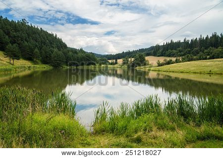 Lake Called Zlatna Surrounded With Meadows And Forest, Levocske Vrchy Mountains, Slovakia.