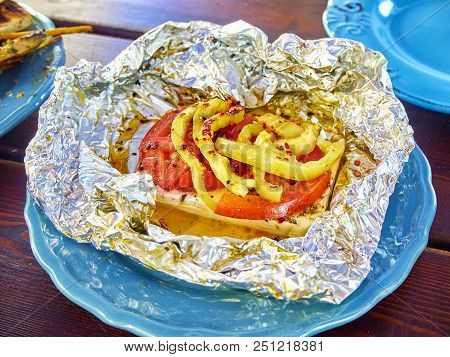 Grilled Feta. Typical Greek Mezze.