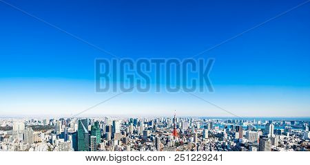 Panoramic Modern City Skyline Aerial View Under Blue Sky In Tokyo, Japan