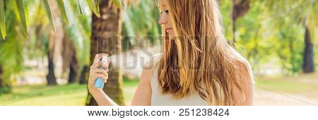 Woman Spraying Insect Repellent On Skin Outdoor. Banner, Long Format