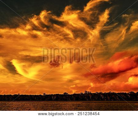 A Eye Catching Inspirational Orange Yellow And Red Coloured Stratocumulus Cloud, Tropical Sunset Sea