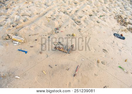 Many Types Of Garbage Are Placed On The Beach.