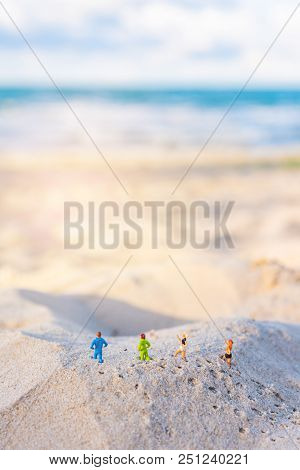 Image Of Two Runner On Sand Beach.