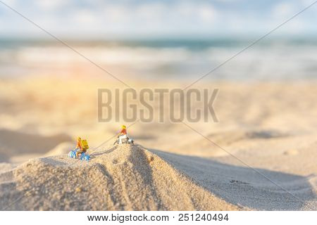 Dolls Couple Biker On The Sand Beach.