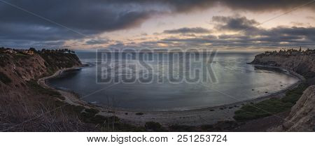 Long-exposure Panorama Of Tall Cliffs Of Lunada Bay With Waves Crashing Onto The Shore After Sunset,