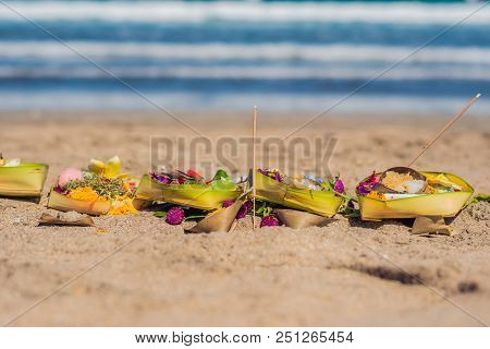 Hindu Offerings And Gifts To God On The Beach In Bali, Indonesia.