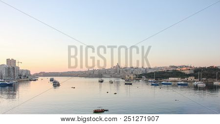 Early Morning Sunrise Over The Grand Harbour Of Valletta