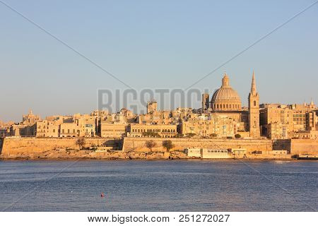 Orange Sunset Over The Grand Harbour Of Valletta
