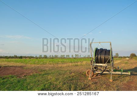 Water Pipeline On The Agricultural Field In Spring.