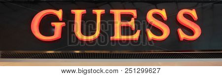 St. Petersburg, Russia - July 25, 2018: Guess Logo On Store Front. Guess Is A Famous American Clothi