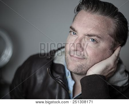 Portrait Of A Handsome Man In A Lether Jacket