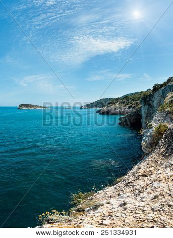 Sunshiny Summer Rocky Sea Coast Baia Di Campi Vieste And Isola Di Campi On The Gargano Peninsula, Pu