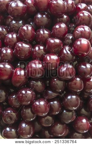 Cooking Cherry Jam.wet  Deep Red сherries On A Background Of Green Leaves . Site About Fruits, Berri