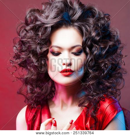 Big Hair. Voluminous Curls. Thick And Voluminous Hair, Portrait Of A Beautiful Young Woman With Red 