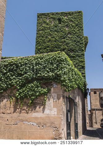 Caceres, Spain - July 13, 2018: House Of The Walls-saavedra And Tower Of Sande, Is Gothic, Of The 14