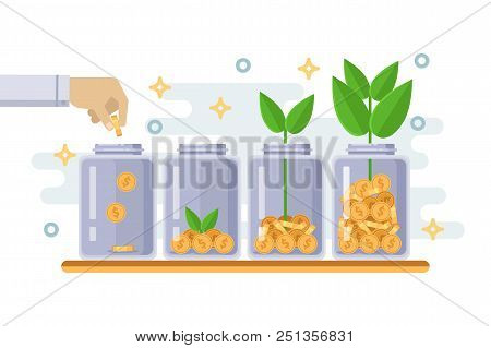 Investment And Finance Growth Business Concept. Hand Putting Coin In Clear Bottle. Green Tree Growin