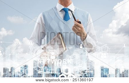 Double Exposure Of Confident And Young Businessman In Smart-casual Wear Smoking Pipe And Modern City