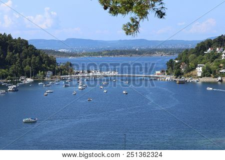 Oslo, Norway - July 22, 2018: View To Oslo Fjord. Two Islands Ormoya And Malmoya Connected To The Ma