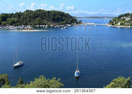 Oslo, Norway - July 22, 2018: View To Oslo Fjord. Two Islands Ormoya And Malmoya Connected To The Ma