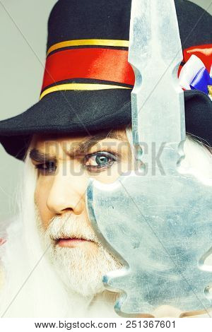 Frown Senior Man Bearded Beefeater Yeomen Warder Or Male Royal Guard Bodyguard In Hat With Spear On 