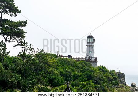 Busan,south Korea - July 20, 2017: Old Lighthouse On The Hill Of Haeundae Dongbaekseom Island On Jul