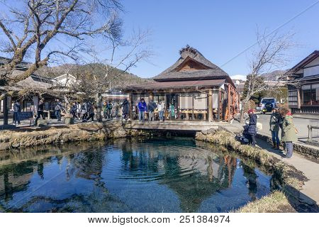 Yamanashi, Japan - January 6, 2018 : Main House And Clear Spring Water Pond In Oshino Hakkai Village