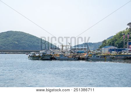 Geoje,south Korea - April 28, 2018: Fishing Boats Are Mooring At Gujora Pier In The Sunny Day On Apr