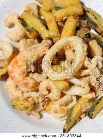 Dish With Squid Rings And Battered Vegetables Ordered By A Customer In A Chinese Restaurant