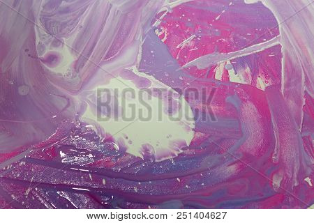 Abstraction Of The Flowing Multi-colored Acrylic Paints