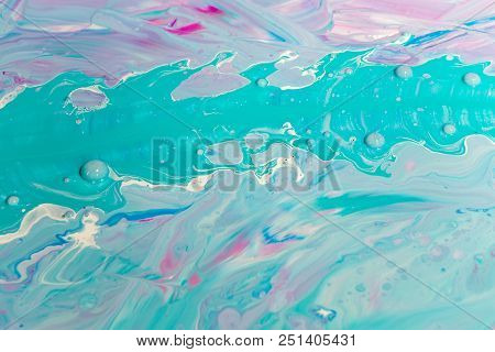 Abstraction Of The Flowing Multi-colored Acrylic Paints