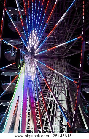 Close up on llluminated ferrish wheel 