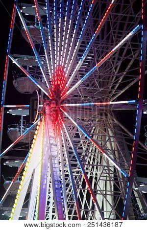 Close up on llluminated ferrish wheel 