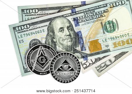 Freemason Symbol Coin On Hundred Dollar Bills. Cryptocurrency Background