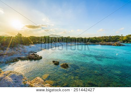 Spiaggia Capriccioli, Beach Of Emerald Coast At Sunset, East Sardinia Island, Italy