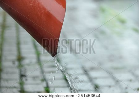 Rainwater Flows From A Drainpipe, Close-up Rain