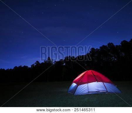 Nylon Tent Pitched For Camping After The Stars Have Come Out