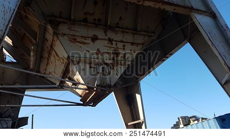 Rusty Sand Silo Along Riverside Of The River Hollandsche Ijssel To Transport Sand From Inland Ships 