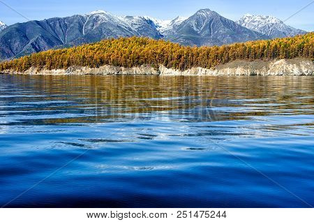 Lake Baikal And Mountains Of Siberia With Clouds Weather And Reflection, Russia